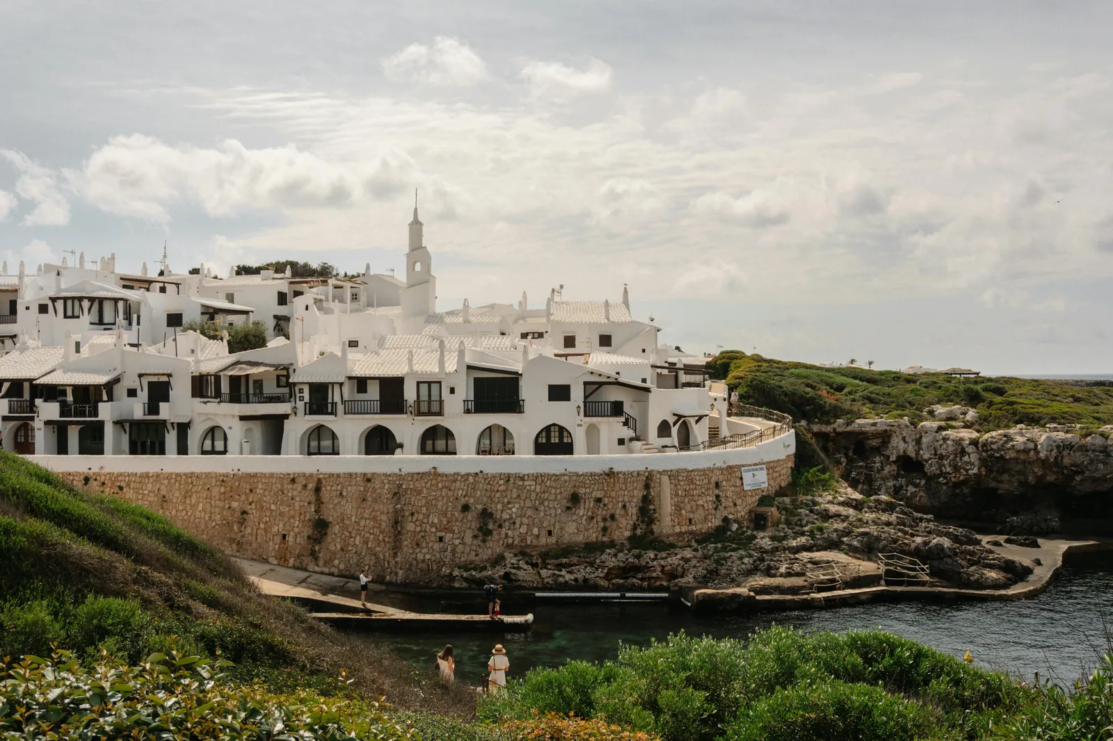Lifestyle shot showing village streets and local atmosphere.